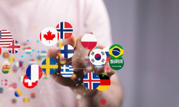 A 3D render of connected world flags near a hand - Foto, imagen