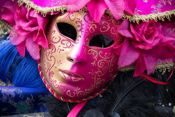 A closeup of a pink decorated carnival mask - Fotó, kép