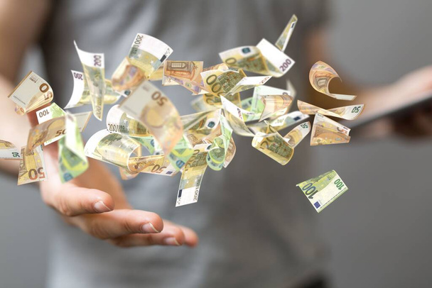 A money rain made of euro banknotes - Foto, Imagem