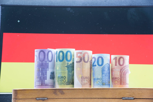 Euro, currency in the EU and flag of european country - 写真・画像