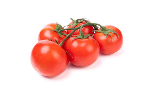 Organic red cherry tomato cluster isolated on white. - 写真・画像