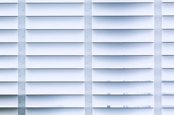 Closed white blinds at home - 写真・画像