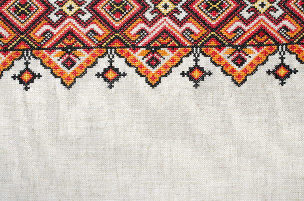 Elemento bordado multicolor en hilos de algodón de lino
 - Foto, imagen