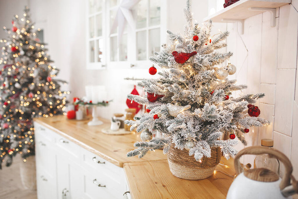 Christmas decoration on the kitchen. Kitchen interior holidays. New Year design. - Photo, image