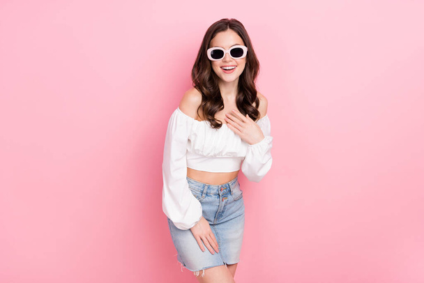 Photo of cute good mood pretty woman in cool sunglass wear fashionable outfit look isolated on pink color background. - Foto, Imagem