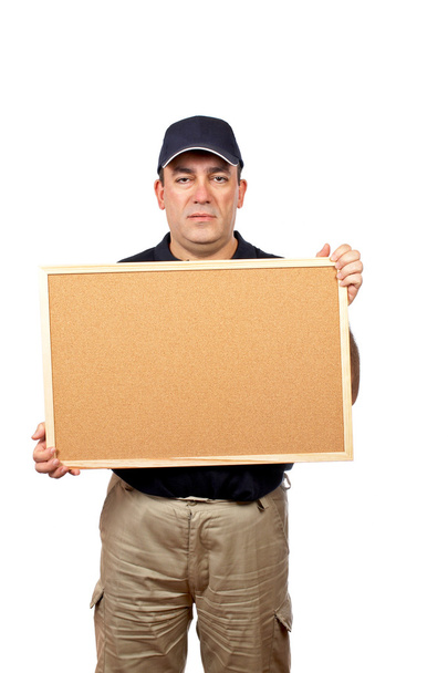 Mensajero sosteniendo el corkboard vacíoboş corkboard holding kurye - Fotoğraf, Görsel