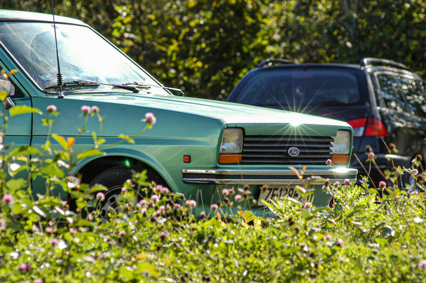 Lindesnes, Norway - september 22 2002: A green metallic Ford Fiesta 1.1L 1980 in a parking lot.. - Φωτογραφία, εικόνα
