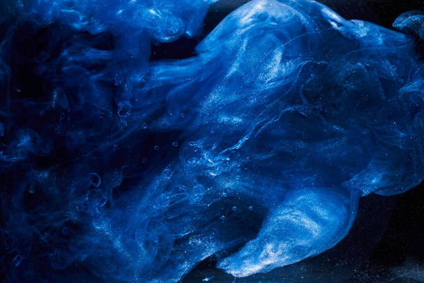 Liquid fluid art abstract background. Blue acrylic paint underwater, galactic smoke ocean - Fotografie, Obrázek