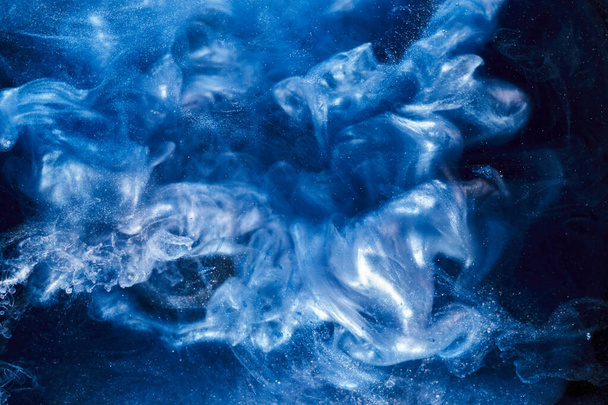 Liquid fluid art abstract background. Blue acrylic paint underwater, galactic smoke ocean - Fotografie, Obrázek