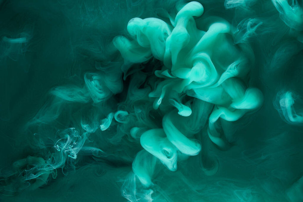Liquid fluid art abstract background. Blue green acrylic paint underwater, galactic smoke ocean - Fotó, kép