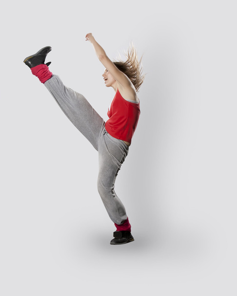 Teenage girl dancing breakdance in action - Zdjęcie, obraz