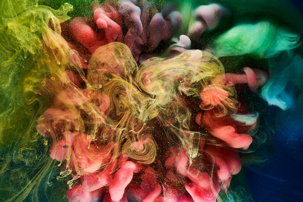 Liquid fluid art abstract background. Mix of dancing acrylic paints underwater - Foto, afbeelding