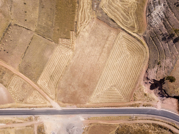 Aerial view of highway in Peruvian Andes. Rural scene during dry season in Cusco Peru. - Photo, Image