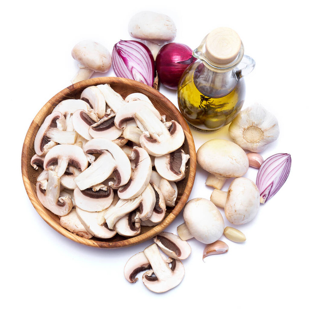 Fresh white champignon mushrooms in wooden bowl isolated on white background. - Φωτογραφία, εικόνα