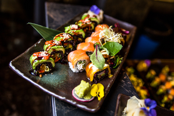 sushi definido em um fundo preto - Foto, Imagem
