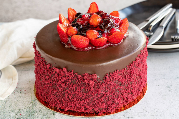 Fruitcake. Chocolate and strawberry cake on a stone background. Celebration and birthday cake. close up - Valokuva, kuva