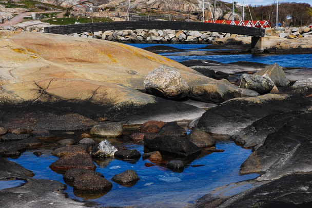 A beautiful view of the rocky coastline of a place called "The End of the World".  Verdens Ende, Norway fjord. Norwegian landscape. - Foto, Imagen