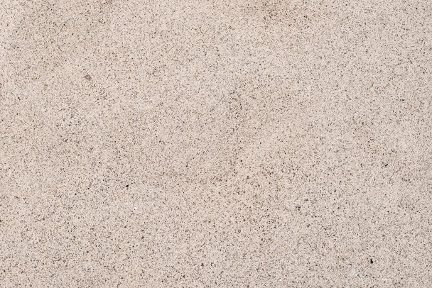 The texture of beautiful coarse sea sand with small pebbles and particles of shells. White sea sand. - Fotografie, Obrázek