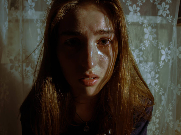 Portrait of young crying girl while nervous breakdown because of severe stress. - Zdjęcie, obraz