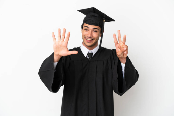 Young university graduate over isolated white background counting eight with fingers - Photo, Image