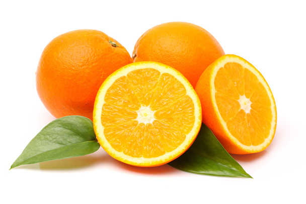 Fresh juicy oranges with leaves - Foto, Imagem