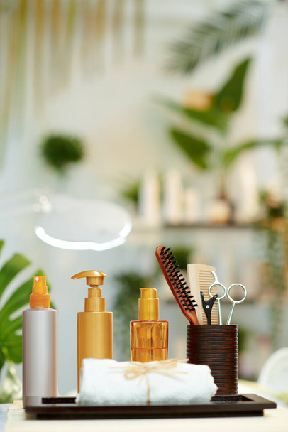 towel and hair care products in modern beauty salon. - Photo, Image