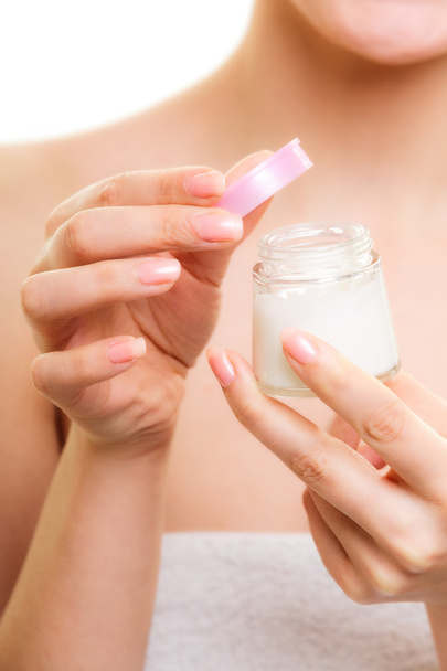 Woman applying moisturizing cream. - Fotoğraf, Görsel