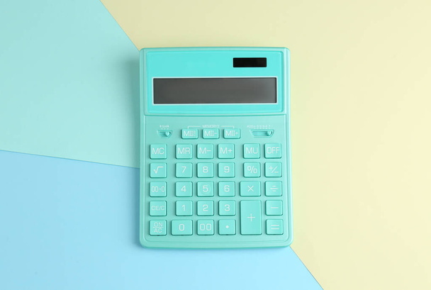 Modern calculator on color background, top view - Photo, image