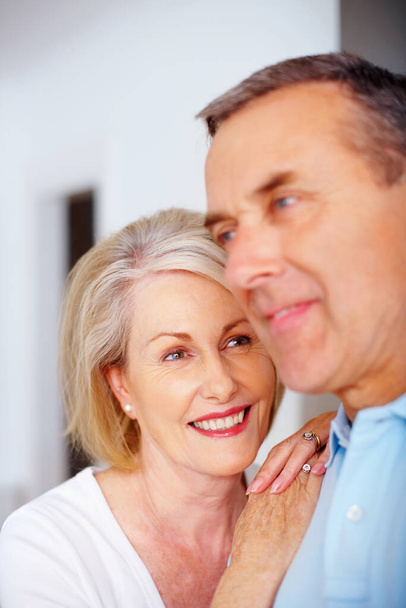 Closeup portrait of a smiling senior woman and husband together in a lovely mood. - Photo, image