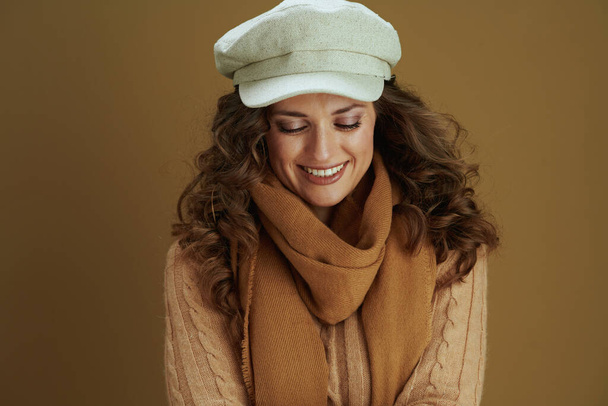 Hello october. happy elegant 40 years old woman in sweater against brown background. - Φωτογραφία, εικόνα