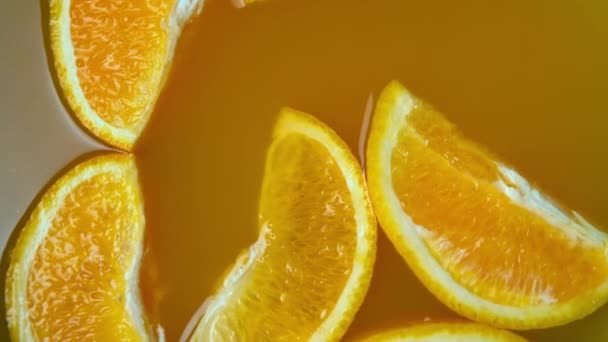 Freshly squeezed juice from citrus fruits view from above. - Video