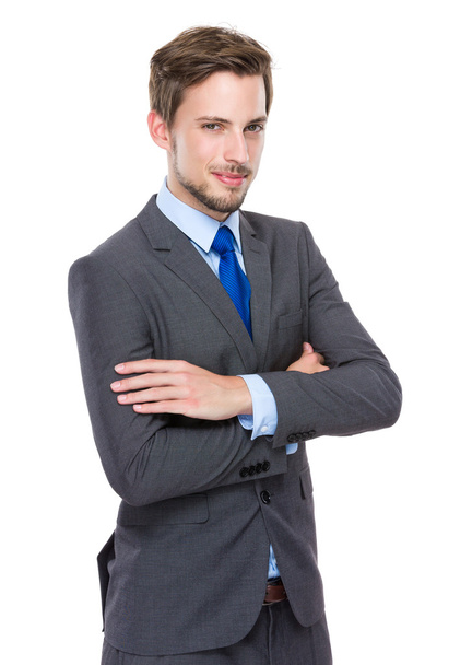Handsome businessman with arms crossed - 写真・画像