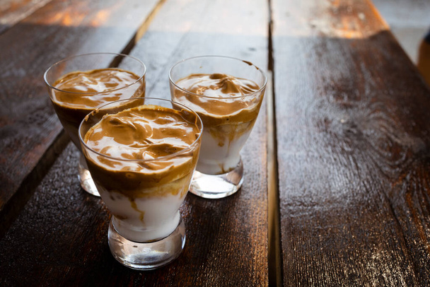Coffee with ice. Dalgona coffee. Creamy coffee with ice milk. - Foto, imagen