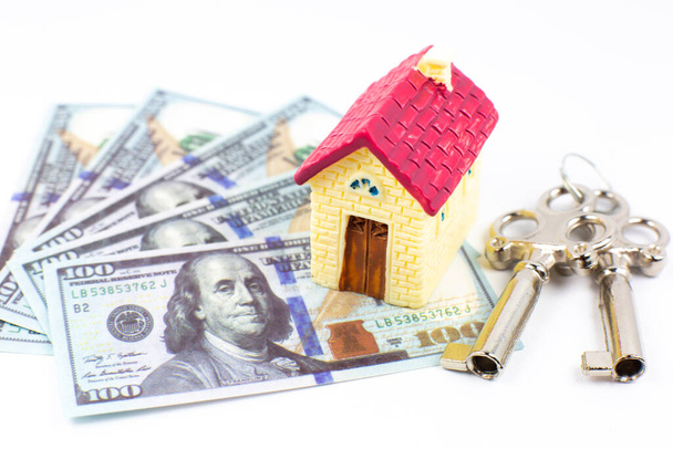 House, keys and dollars. Buying and renting real estate. Bank credit for property. Save money. - Valokuva, kuva