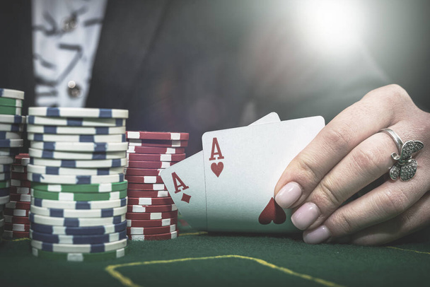 young woman bets in the casino having a winning combination. gambling - Foto, Imagen