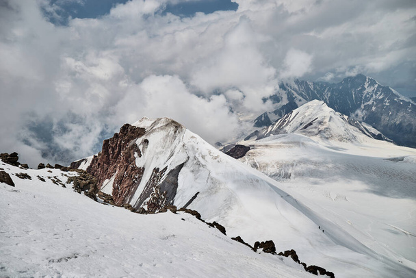 Climbing Kazbek, Georgia. trail to the summit.  Nature of Caucasian mountains. Mount Kazbek alpinist expedition - Photo, image