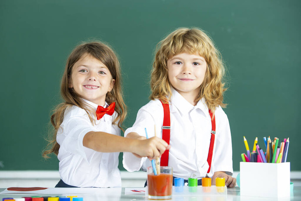 Back to school. Two little schoolkids. Education and friendship in school concept - Foto, Imagem