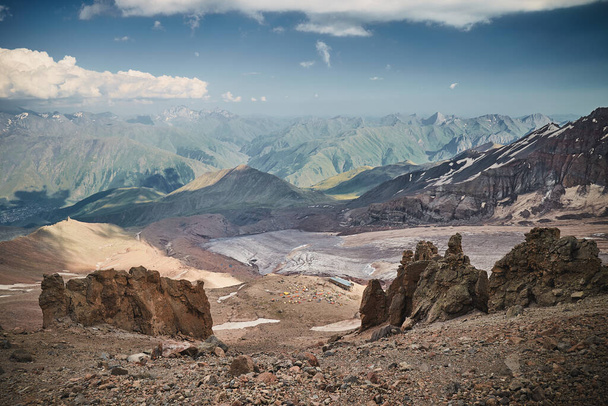 Mt Kazbeg base camp with view on Gergeti glacier. Meteostation in Kazbek, Georgia. Mount kazbek alpinist expedition - Photo, Image