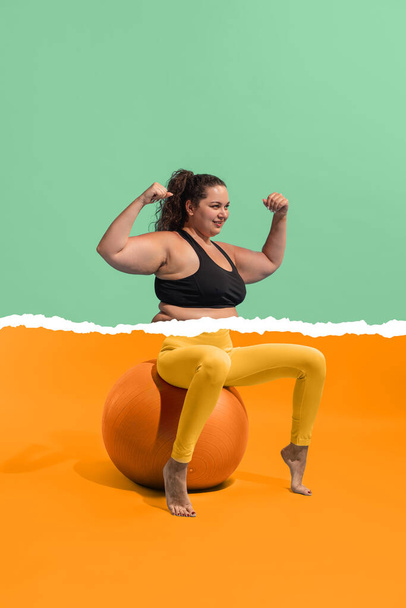 Bodypositive. Young plus-size woman with body, legs og slim girl in weight loss process isolated on blue-yellow background. Weight loss, fitness, healthy eating, active lifestyle, challenges concept. - Valokuva, kuva