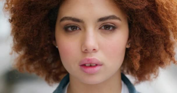 Face of beautiful young woman with an afro. - Video
