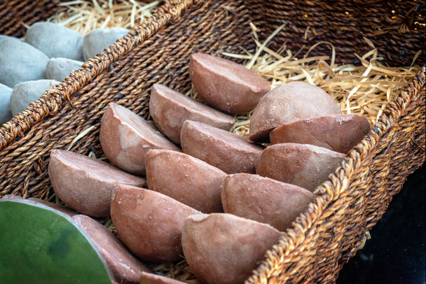 Handmade coffee soap in the basket at the street market stall. Selective focus. Closeup. - Photo, Image