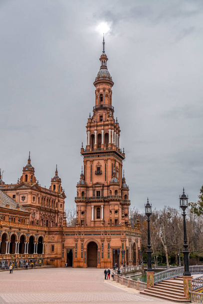 Seville, Spain - Feb 24, 2022: Plaza de Espana is a square in the Parque de Maria Luisa in Seville, Spain. Built in 1928 for the Ibero-American Exposition of 1929. - Fotoğraf, Görsel