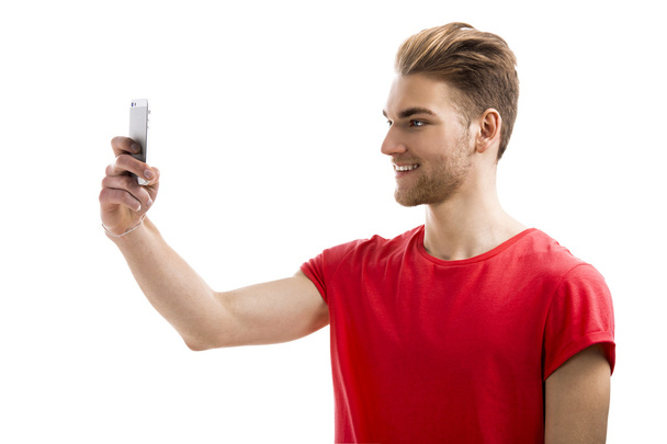 Young man taking a selfie - Zdjęcie, obraz