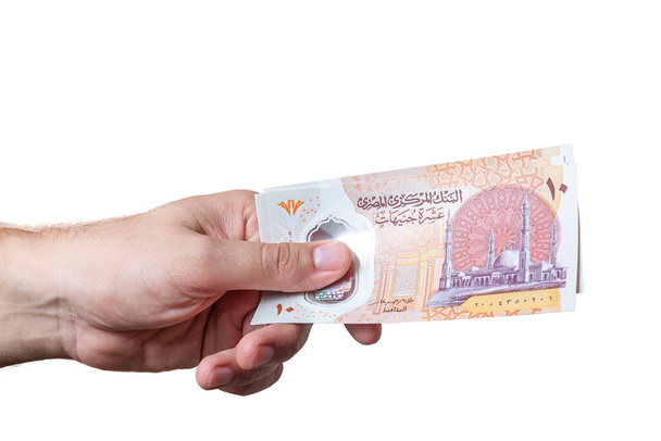 Egyptian Money, Man Holdoning Wallet, Paper Banknotes, Plastic New Ten Egyptian Pound, Arabic Side - 写真・画像