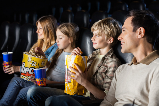 Family Watching Movie In Theater - Фото, изображение