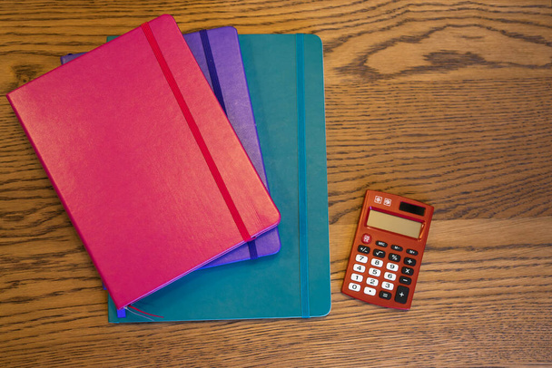 pile of notebook journals on tabletop - Foto, Bild