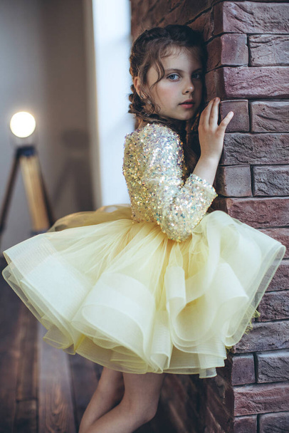 Happy little girl in a beautiful dress. High quality photo - 写真・画像
