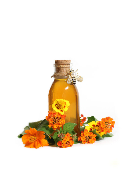 Fresh Local Honey With Honeycomb and Flowers Isolated on White Background - Foto, afbeelding