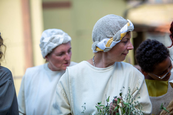 Canossa,Reggio Emilia - Italy : 2019 01 07 Medieval historical re-enactment of Martilde di Canossa with flag-wavers and extras in themed dresses. High quality photo - Photo, Image