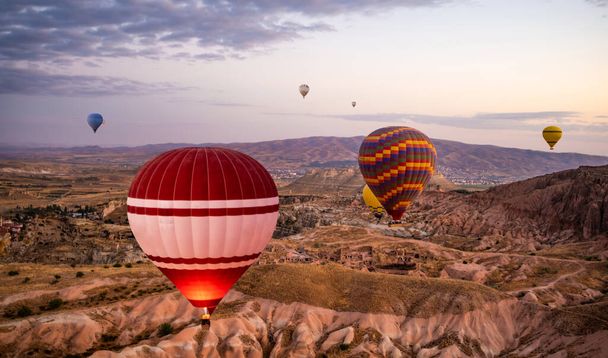Colorful hot air balloon festival floating in Cappadocia, Turkey - Фото, изображение